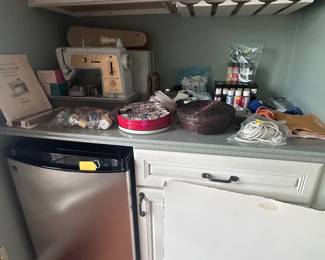 Small refrigerator, sewing machine, craft supplies