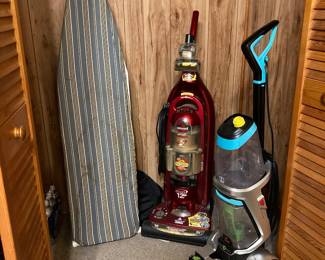 Vacuum cleaners, ironing board