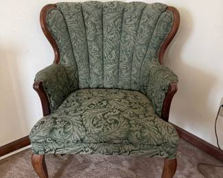 Two wingback chairs, green fabric
