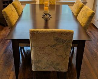 Crate & Barrel expandable dining table with 6 upholstered chairs. $1100. Includes 2 leaves. Originally $4,000. Selling as a set.