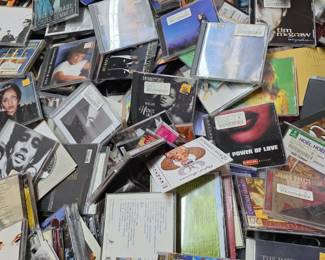 DVDS, CASETTES, CDS, VHS TAPES WILL BE $1.00 EACH