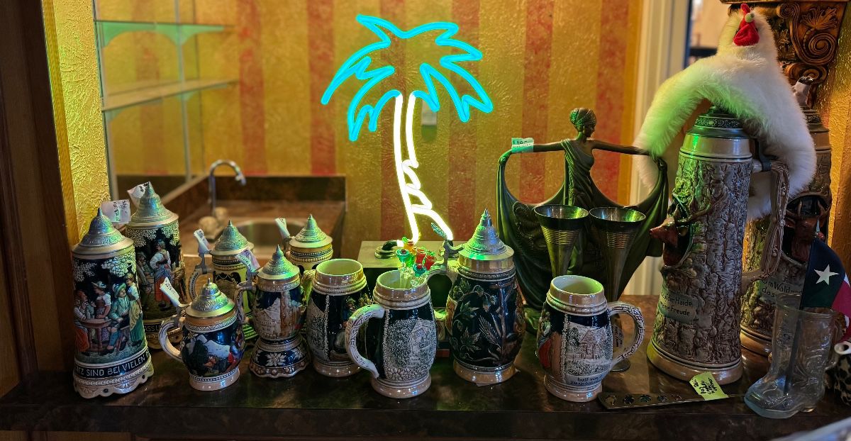 German beer steins, Florida palm tree neon, lovely dancing lady, rooster hat