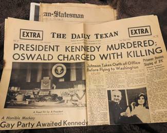 One of several newspapers, extas/ magazines on JFK