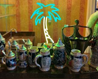 German beer steins, Florida palm tree neon, lovely dancing lady, rooster hat