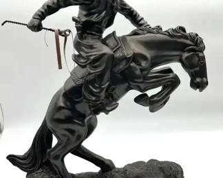 Resin sculpture Bronco buster.