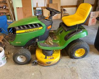 Johnnie Riding Lawnmower