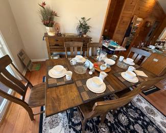 A 40-piece Pfaltzgraff Country Cupboard dinnerware set with embossed floral and vine pattern.