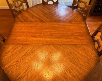 Walnut dining room table - expandable with 2 leaves
