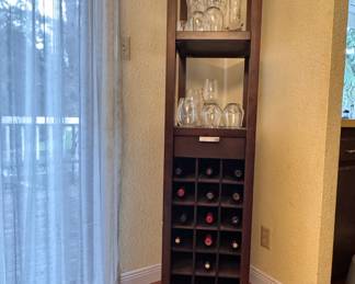 Wine storage cabinet with hanging glass racks 