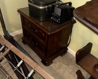 One of two matching two drawer bedside tables