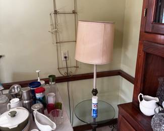 Vintage floor lamp with brass base and glass table surface