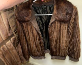 Absolutely the cutest vintage, zip up, elastic waist fur coat I have ever seen!!!! You know you want this thing.