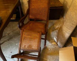 Wicker seated rocker with matching foot stool