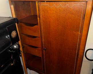 This Vintage armoire with inside drawer storage is in great condition