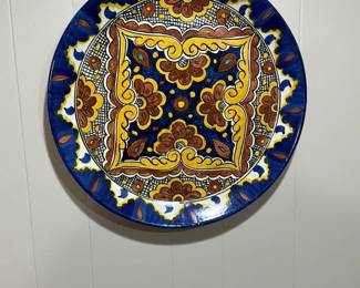 A decorative Mexican Talavera plate (with wall display hardware)