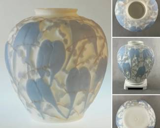 A lovely vintage Phoenix Consolidated satin glass vase featuring a lovebirds on flowering branches design that surrounds the vase. 