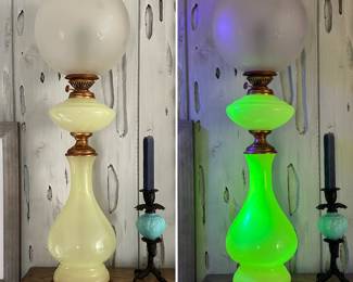 A fantastic large opaline uranium glass electrified banquet lamp with frosted glass globe shade