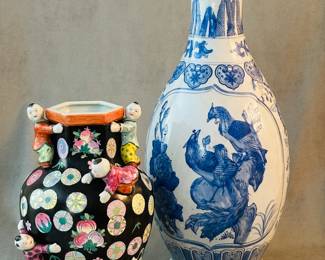 Two vintage Chinese decorative vases, a blue and white porcelain baluster form vase with underglaze blue birds and precious objects, and a famille noire glaze "fertility" vase with sculpted figures of climbing children