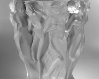 A Lalique France frosted crystal "Bacchantes" vase, featuring a row of classical maidens with linked arms in a continuous band; engraved Lalique ® France on side of the base, H 9.45" D 7.44"