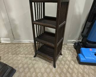 A vintage small wooden three-tiered shelf / plant stand 