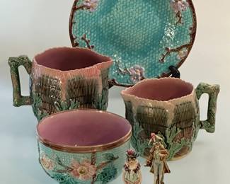 A majolica plate c. 1880, turquoise basket weave and pink floral pattern by Joseph Holdcroft, Sutherland Pottery; an American majolica waste bowl c. 1880-90 with turquoise rope/basketweave pattern ground w/raised wild rose pattern; a pair of c. 1880 antique majolica pitchers in shell/seaweed pattern by American potter Griffin, Hill & Smith, shades of pink, green, brown w/lavender liner, impressed double circle trademark Etruscan Majolica GHS, 4-1/4" H and 4-3/4" H; rare pair of majolica miniatures, gentleman and lady dressed as 18th century French nobility, incised numerals on base.
