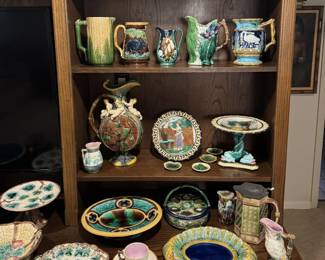 Antique majolica pitchers, plates, bowls, tankards, vases, including rare pieces from Wedgwood, Minton, George Jones, Griffin, Hill & Smith, and more. 