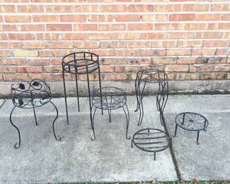 A selection of wrought iron plant stands 