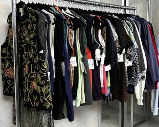 More racks of women's clothing available at this estate sale