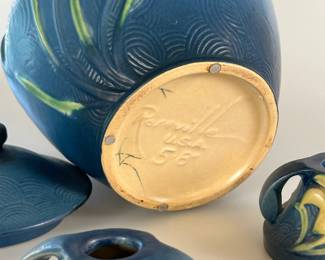 Another view of the Roseville Pottery Zephyr Lily Bermuda Blue cookie jar with lid, and matching pair of candlesticks; vintage 1940s/1950s.