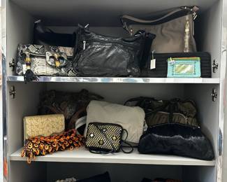 A diverse selection of handbags, totes, purses, and clutches for evening wear, casual, sporty, and travel including a black LeSportsac shoulder bag, and a vintage rare Atalla black leather and gold studded crossbody bag, 