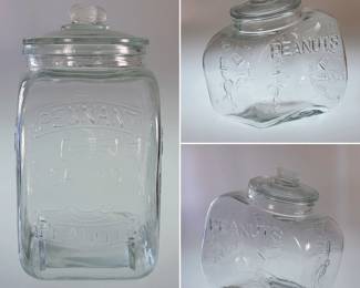 A large vintage Pennant Salted Peanuts countertop store display lidded jar, with various poses of peanut figure wearing top hat, and a peanut finial on the lid