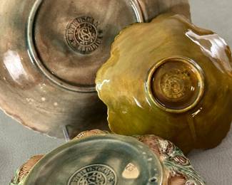 Reverse view of three late 19th century Majolica plates and bowls in the Etruscan Shell/Seaweed pattern by Griffin, Smith & Hill; marked on base with impressed double circle trademark Etruscan Majolica GHS, circa 1880-90.