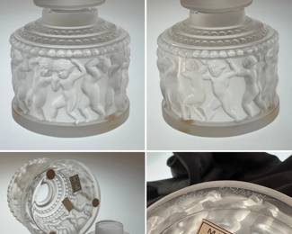 A signed Lalique crystal "Enfants" round perfume bottle with stopper.