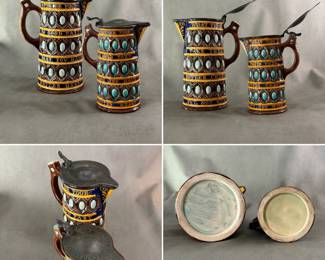 2 antique Wedgwood majolica pitchers known as “caterers jug” designed by Frederick Brett Russel, moulded body with three bands oval forms in turquoise and brown between three cobalt blue and yellow-edged bands with lines from Shakespeare’s Comedy of Errors “What tho my gates be poor, Take them in good part, Better cheer may you have, but not with better heart” in raised ochre-color letters. Pewter lids marked James Dixon & Sons, Sheffield. 9-1/2" H w/impressed Wedgwood mark, date code for 1870, incised monogram FBR for Frederick Bret Russel, and 7-1/2" pitcher with impressed Wedgwood mark, circa 1860-70.  
