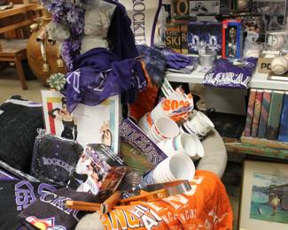 Rockies Towels blankets Programs Cups and a few Broncos items as well