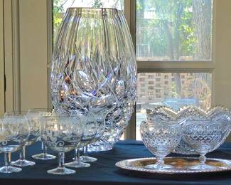 Monumental vase in fitted boxes, etched stemware and cut glass.