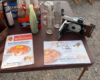 vintage cookbooks, bottles and camera