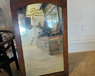Antique Queen Quality Shoes advertising cheval mirror with oak frame.