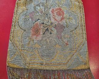Antique Art Deco floral beaded purse with fringe and metallic frame. France 1920