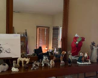 Living room.  Dog collection.  Nice mirror.  