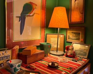 Home office area.  Serape, art work, knickknacks. 