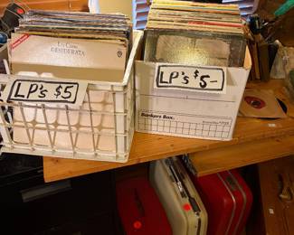 Home office area.  LP’s.  Vintage luggage.