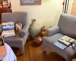 2 clean simple upholstered side chairs.  Vintage Clue game.  Coffee table books.