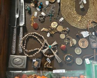 Jewelry case.  Sterling carving set, Bakelite beads, WWII Luftwaft swastika belt buckle, large sandcast silver Native  American cross, other turquoise .