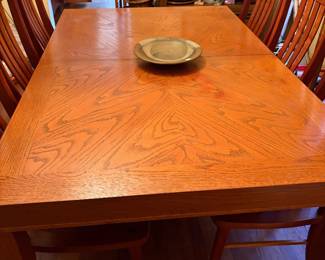Dining table.  Some discoloration on right side of table.