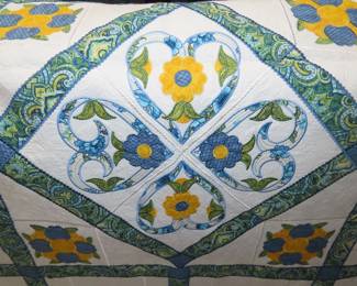 Beautiful unfinished embroidered patchwork quilt.