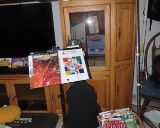 Guitars, music books, candles, BluRay DVDs.