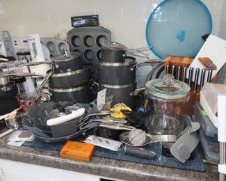 Kitchen cookware and Japanese steak knives.