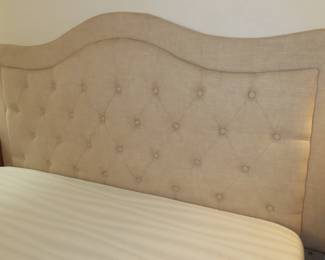 Deep tufted headboard.