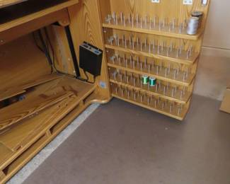 Koala sewing station with multy changing options, drawrs, shelves, power, cutting tables, sewing machine storage.